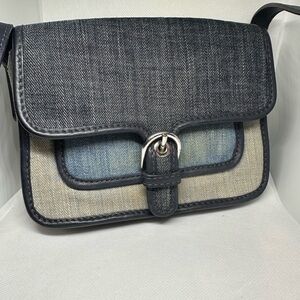 Michael Kors Denim Crossbody Shoulder Bag in Faded Denim colors.